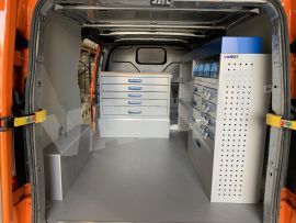 Aluminium van racking, work bench, aluminium drawers blue linbins and blue services cases with XLD Underfloor