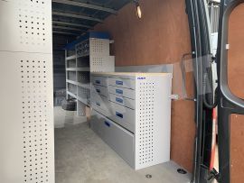 Offside van shelving with aluminium drawers and blue services cases 