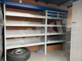 Offside van shelving with aluminium drawers and blue services cases 