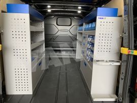 Offside van shelving with aluminium drawers and blue services cases 