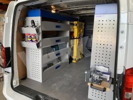 nearside van shelving and plastic linbins with aluminium drawers and blue services cases